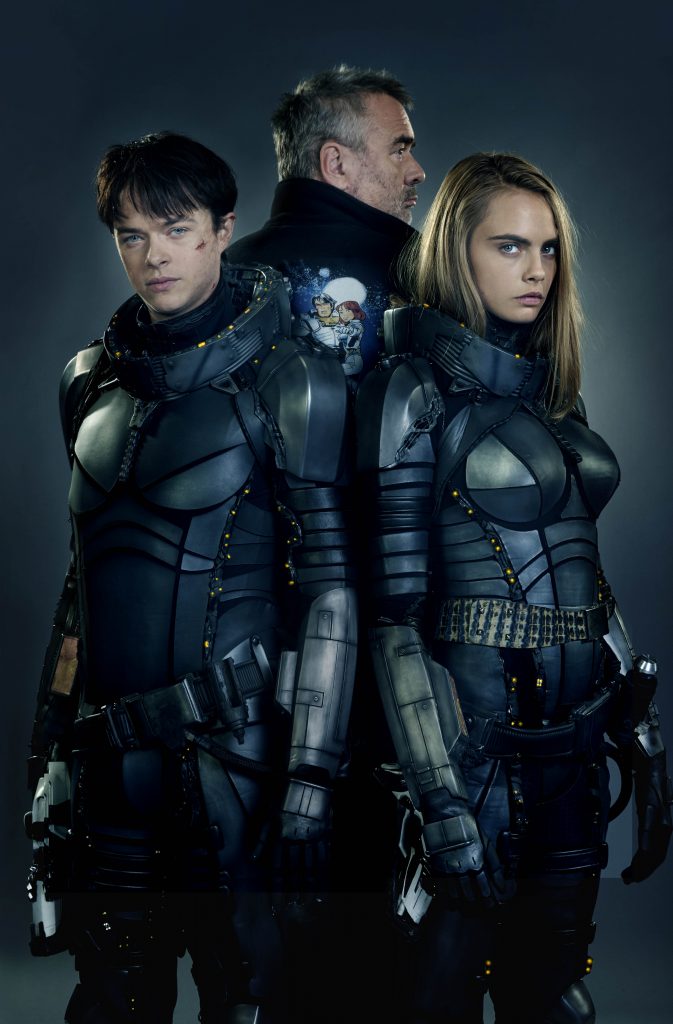 M-1VDF-2727145-1 (Left to right.) Star Dane DeHaan, director Luc Besson and star Cara Delevingne team up for EuropaCorp's Valerian and the City of a Thousand Planets. Photo credit: Daniel Smith © 2016 VALERIAN SAS Ð TF1 FILMS PRODUCTION